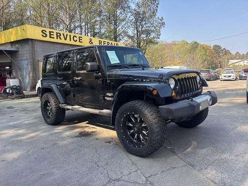 Black 2013 Jeep Wrangler Unlimited Sahara