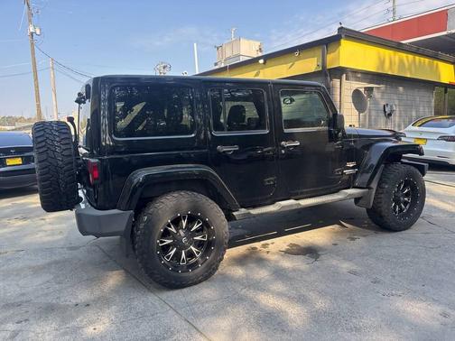 Black 2013 Jeep Wrangler Unlimited Sahara
