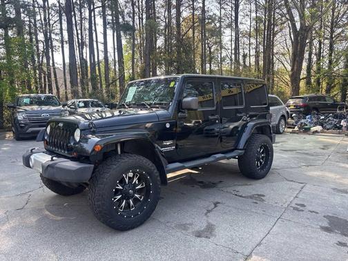 Black 2013 Jeep Wrangler Unlimited Sahara