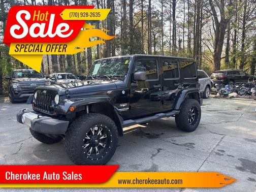 Black 2013 Jeep Wrangler Unlimited Sahara