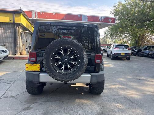 Black 2013 Jeep Wrangler Unlimited Sahara