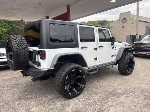 White 2015 Jeep Wrangler Unlimited Sport