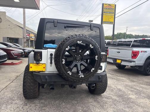 White 2015 Jeep Wrangler Unlimited Sport
