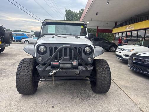 White 2015 Jeep Wrangler Unlimited Sport