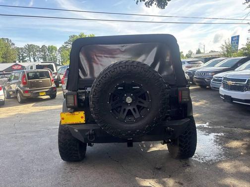 Black 2014 Jeep Wrangler Unlimited Sport