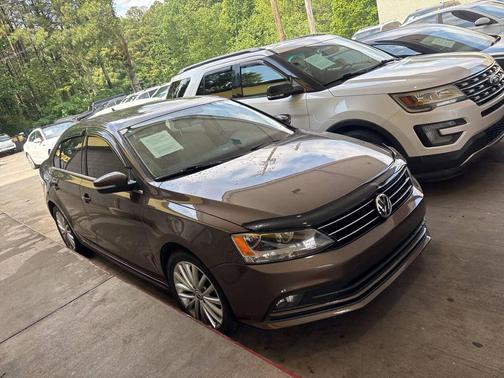 Brown 2016 Volkswagen Jetta 1.8T SEL Premium