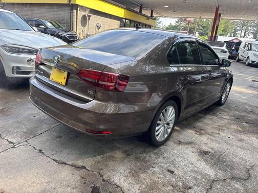 Brown 2016 Volkswagen Jetta 1.8T SEL Premium