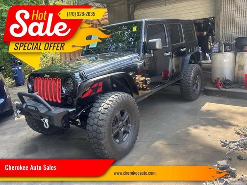 Black 2013 Jeep Wrangler Unlimited Sahara