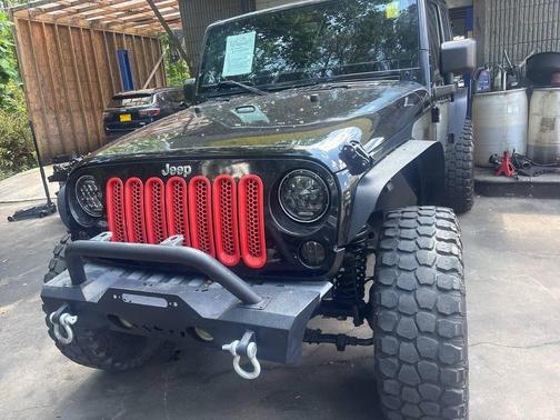 Black 2013 Jeep Wrangler Unlimited Sahara