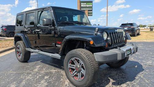 Black Clearcoat 2012 Jeep Wrangler Unlimited Sahara