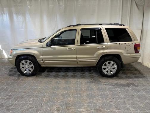 Gold 1999 Jeep Grand Cherokee Limited 4WD