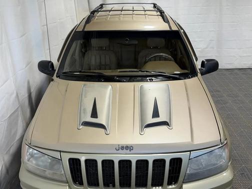 Gold 1999 Jeep Grand Cherokee Limited 4WD
