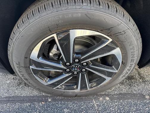 iridescent white tricoat 2026 Buick Enclave Sport Touring