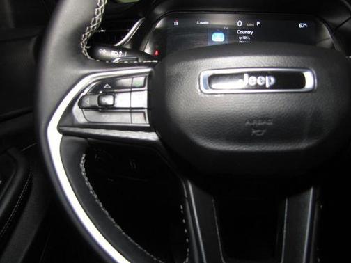 White 2025 Jeep Grand Cherokee Altitude