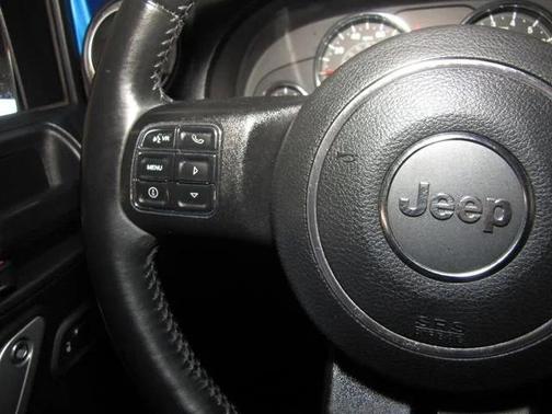 Blue 2016 Jeep Wrangler Unlimited Sahara