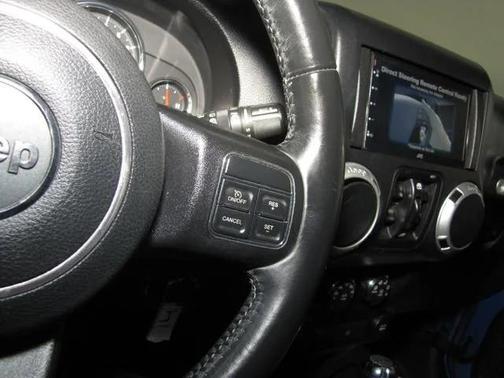 Blue 2016 Jeep Wrangler Unlimited Sahara