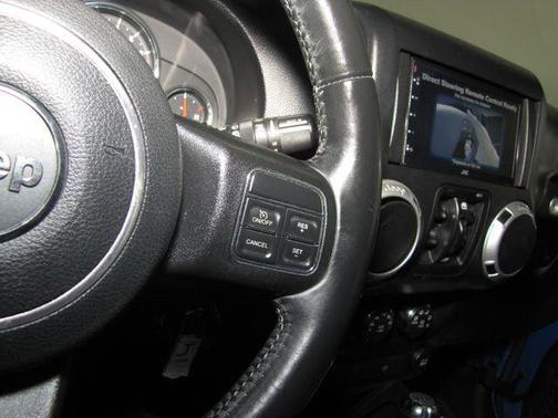 Blue 2016 Jeep Wrangler Unlimited Sahara