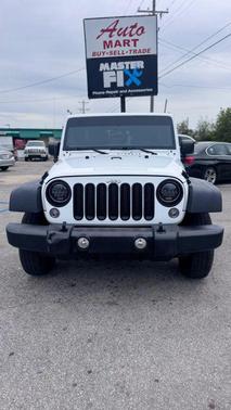White 2016 Jeep Wrangler Unlimited Sport