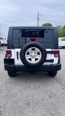 White 2016 Jeep Wrangler Unlimited Sport