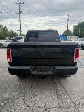 Black 2016 RAM 1500 Laramie