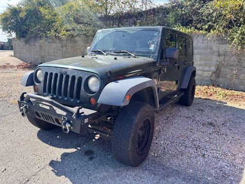 Natural Green Pearlcoat 2010 Jeep Wrangler Unlimited Sport