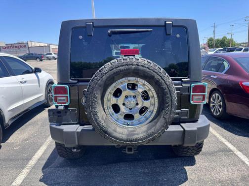 Black Clearcoat 2012 Jeep Wrangler Unlimited Sport