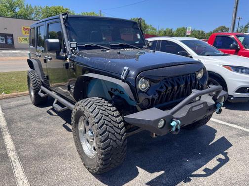 Black Clearcoat 2012 Jeep Wrangler Unlimited Sport