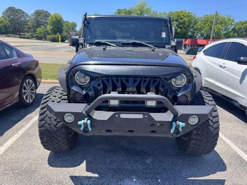 Black Clearcoat 2012 Jeep Wrangler Unlimited Sport
