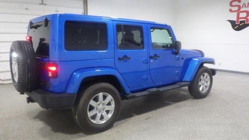 Blue 2016 Jeep Wrangler Unlimited Sahara