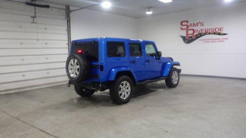Blue 2016 Jeep Wrangler Unlimited Sahara