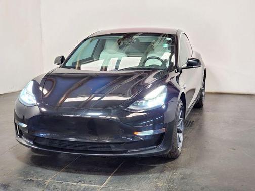 Solid Black 2018 Tesla Model 3 Mid Range