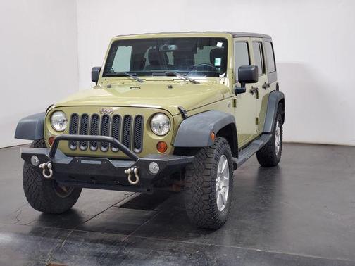 Commando Green 2013 Jeep Wrangler Unlimited Sahara