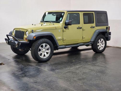 Commando Green 2013 Jeep Wrangler Unlimited Sahara