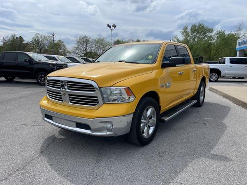 Yellow 2016 RAM 1500 Lone Star