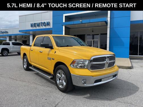 Yellow 2016 RAM 1500 Lone Star