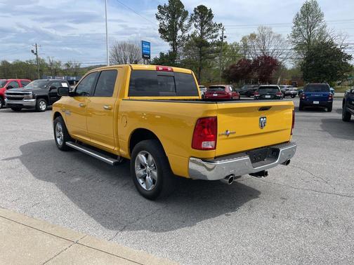 Yellow 2016 RAM 1500 Lone Star