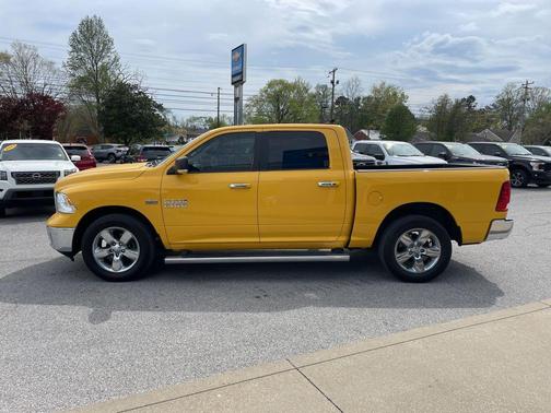 Yellow 2016 RAM 1500 Lone Star