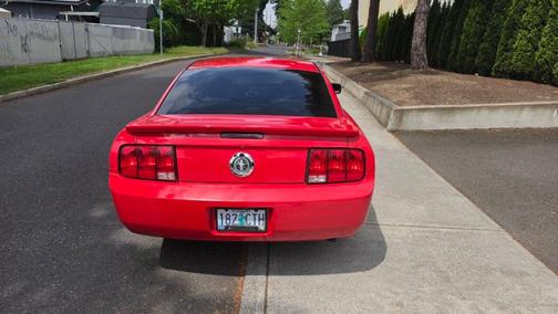 Red 2007 Ford Mustang Deluxe