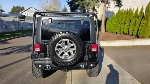 Black 2014 Jeep Wrangler Unlimited Rubicon