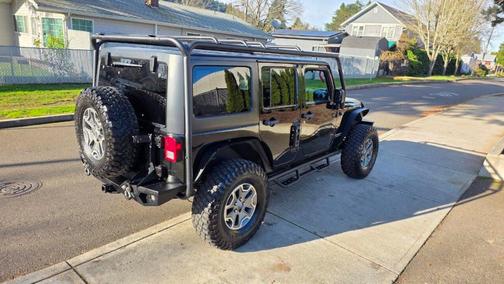 Black 2014 Jeep Wrangler Unlimited Rubicon