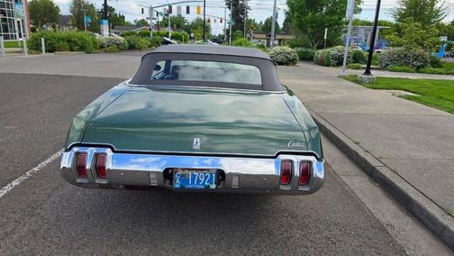 Green 1970 Oldsmobile Cutlass SÂ 350