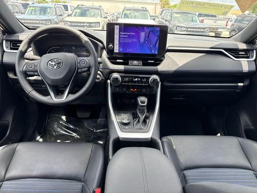 Magnetic Gray Metallic/Midnight Black Metallic 2024 Toyota RAV4 Hybrid SE