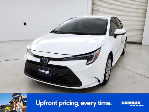 White 2024 Toyota Corolla Hybrid SE