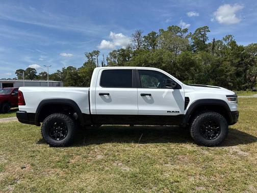 Bright White Clearcoat 2026 RAM 1500 RHO Crew Cab 4x4 5'7' Box