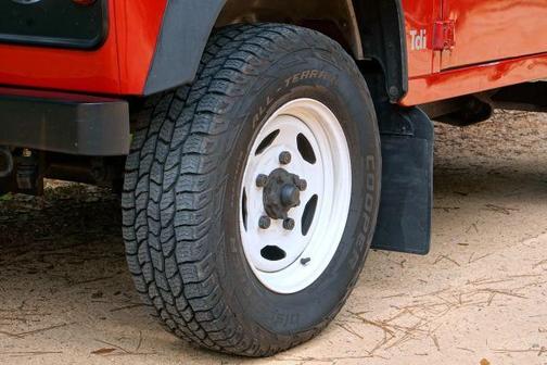 Red 1996 Land Rover Defender 90