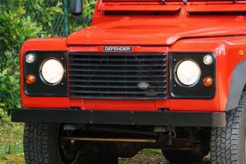 Red 1996 Land Rover Defender 90