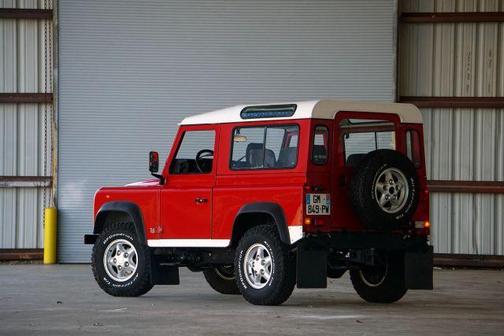 Red 1996 Land Rover Defender 90