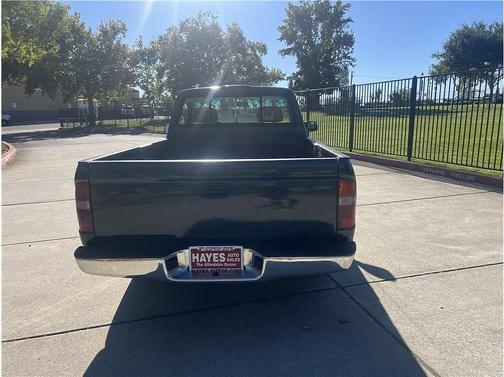 Green 1995 Toyota Tacoma Short bed
