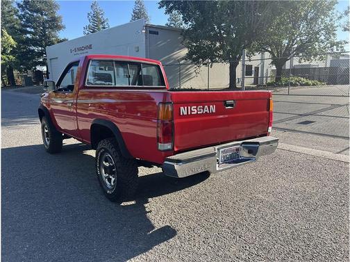 Red 1993 Nissan Pickup Truck Short Bed