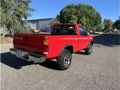 Red 1993 Nissan Pickup Truck Short Bed